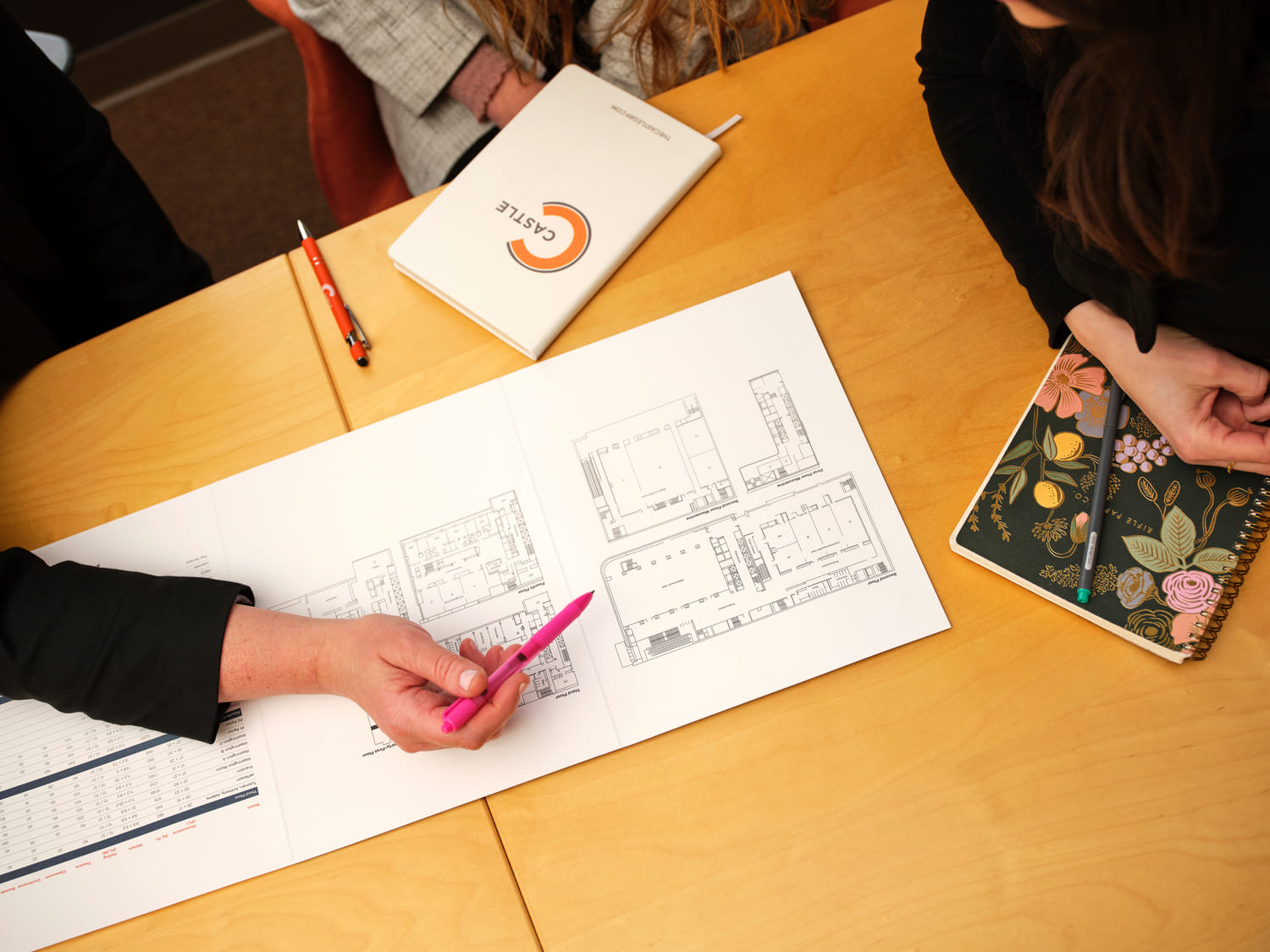 Event team working on a floor plan